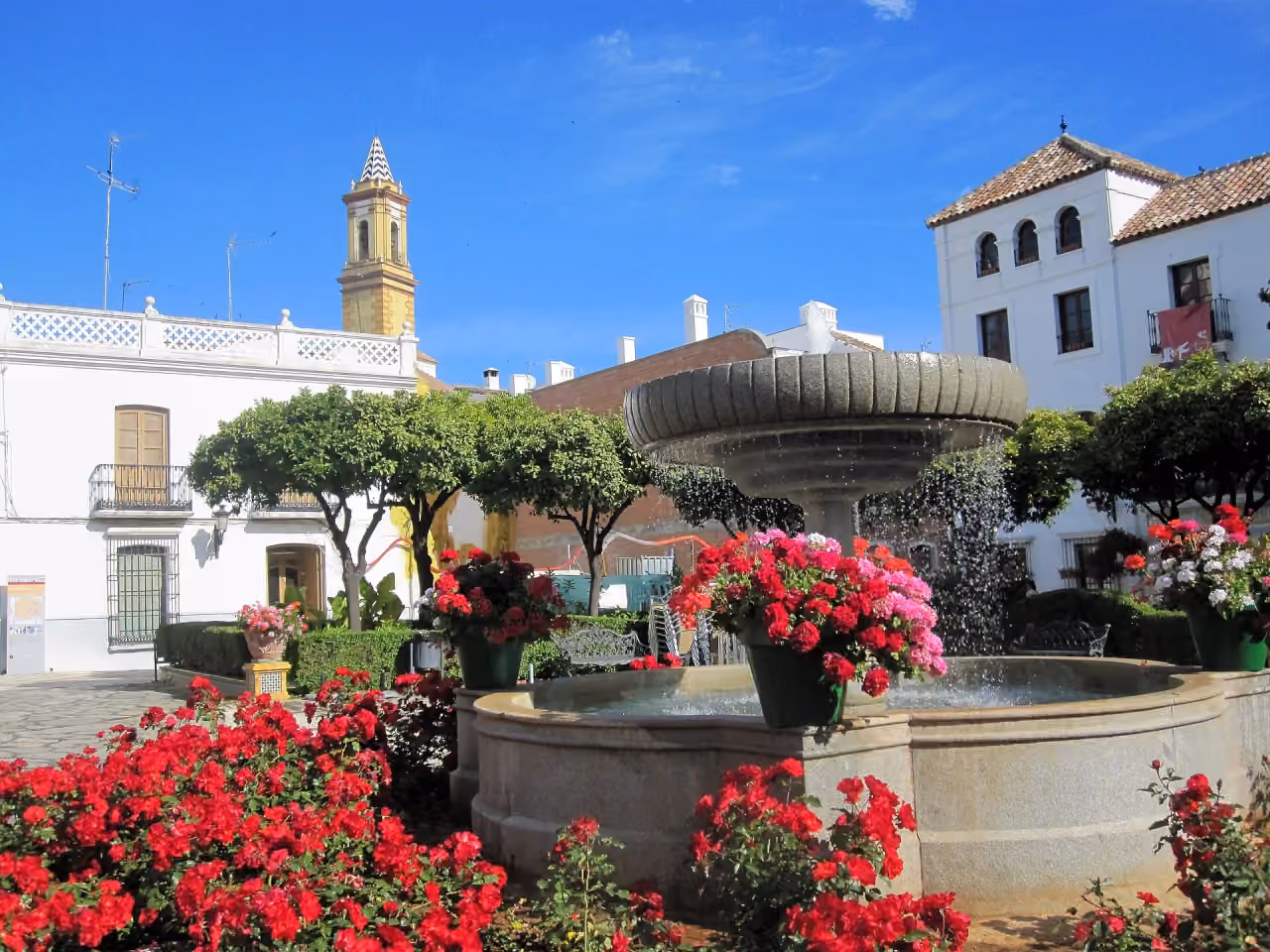Flower-filled Plaza de las Flores in Estepona old town, a destination from Habitat Valle Romano